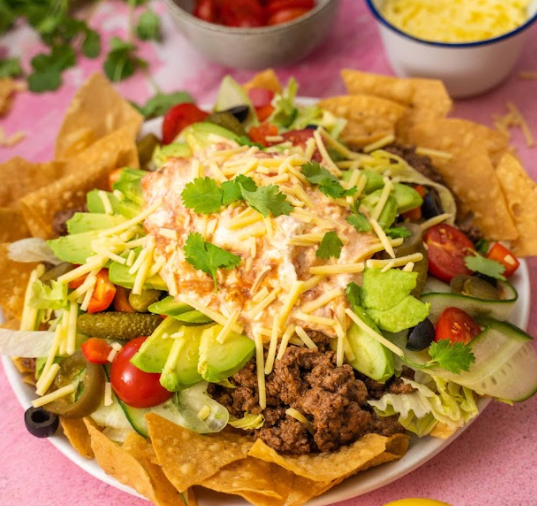 Loaded beef nacho salad with avocado