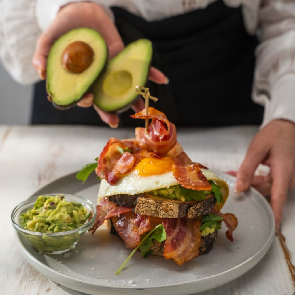 Bacon and egg stack with avocado coriander salsa